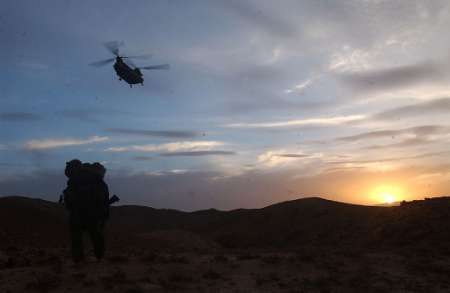 Twilight extraction via CH-47D Chinook helicopter.