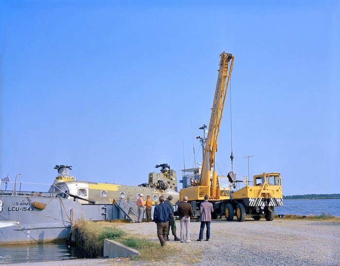 1973: CH-47C Chinook helicopter 67-18542 sitting on a barge enroute to Langley Air Force Base, Virginia in 1973. The aircraft was transported from Fort Eustis, Virgina, and was destined for destruction as part of the crash testing conducted in support of the U.S. Army by the National Aeronautics and Space Administration (NASA).