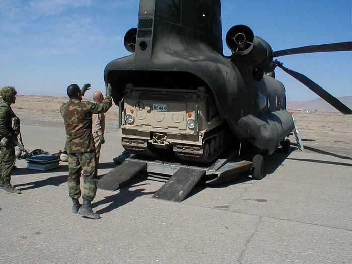 86-01669 in Afghanistan practicing cargo loading maneuvers.