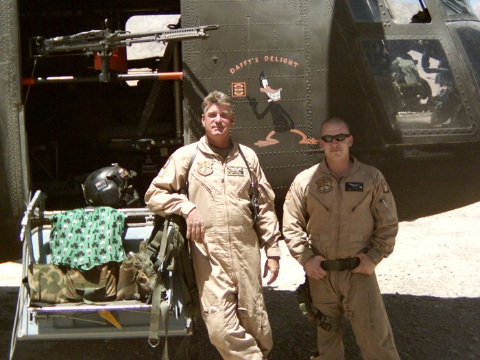 SPC Jason Engel, Crew Chief, and SSG Chuck Nabors, Flight Engineer, stand proudly in front of "Daffy's Delight".