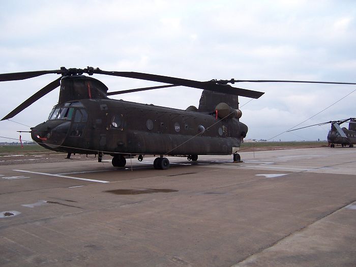 90-00224 - parked at Balad, Iraq - showing the aft landing gear repairs that were made utilizing parts from 90-00212 and a wrecked Iranian Chinook.