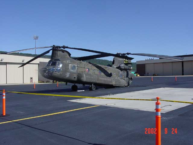 Boeing CH-47D Chinook 91-00233 at the accident site showing the damage caused by the swashplate failure.