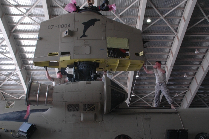 April 2009: CH-47F Chinook helicopter 07-08041 gets the aft pylon reinstalled after being transported to Afghanistan.