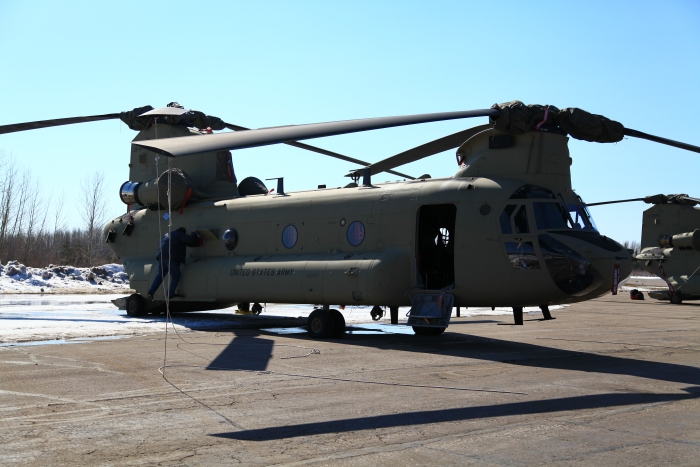 17 April 2012: CH-47F Chinook helicopter 08-08764 gets bedded down for the night at Fort Nelson, British Columbia, Canada.