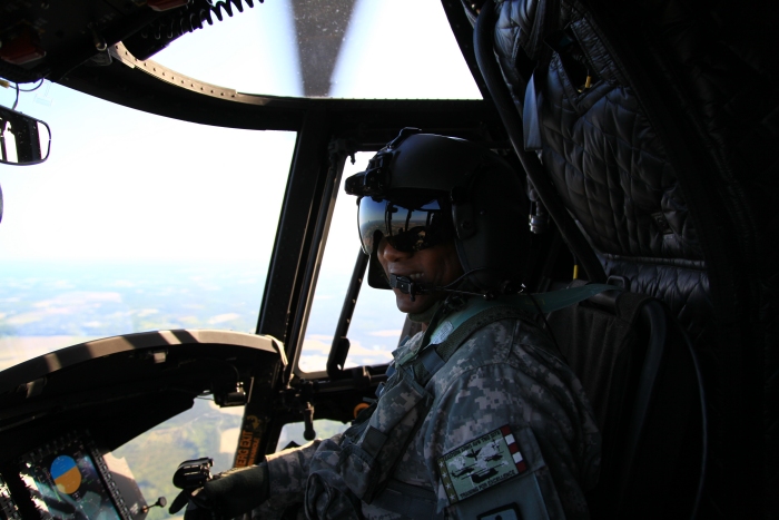 10 April 2012: CW4 Bruce Linton, Copilot of 08-08771 handles the sticks over Georgia while enroute to Alaska. Bruce did 99 percent of the flying on this aircraft during the trip, while the Pilot in Command - Mark Morgan - performed the duties of mission manager and Sortie 1 senior photographer.