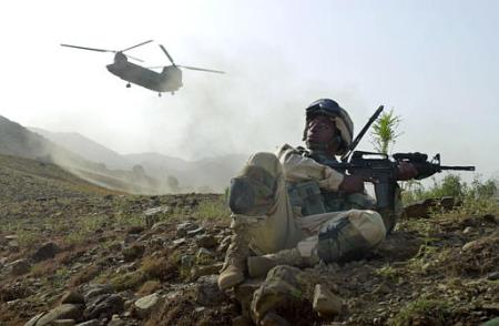 A U.S. Army soldier of the 82nd Airborne Division, from Fort Bragg, North Carolina, secures the perimeter.