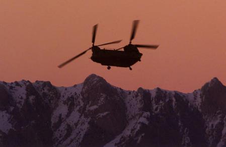 A U.S. Army CH-47D Chinook helicopter flies over the Paktia province town of Gardez, Afghanistan.