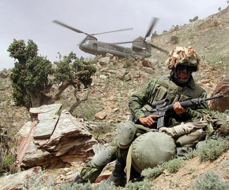 Corporal Shawn Merchant, 27, of Edmonton, watches out for enemy threats.