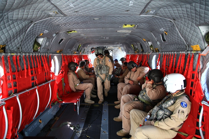 11 September 2013: The crew of CH-47F Chinook helicopter 12-08111 returns the ferry flight aircrews to Millville.