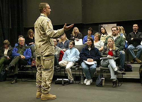 Major Grant Haugen returned to the area for a short stay so he could let loved ones know in person that the Army Reserve unit he heads will be staying longer in Iraq. It is the third extension for the Chinook helicopter unit based at Fort Lewis.