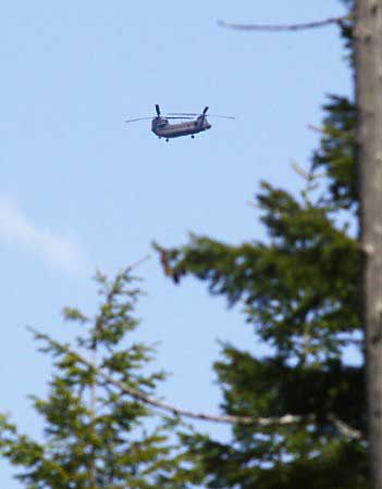 A Washington Army Reserve Chinook rescues people on Mt. Rainier.