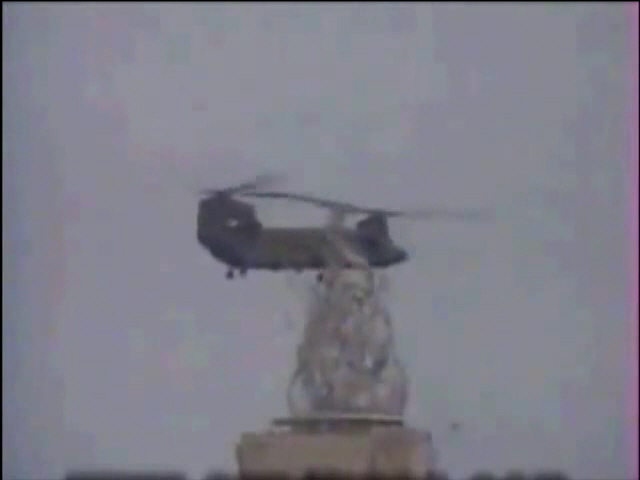 View the Video: A South Korean Chinook crashes while placing a sculpture on a bridge.